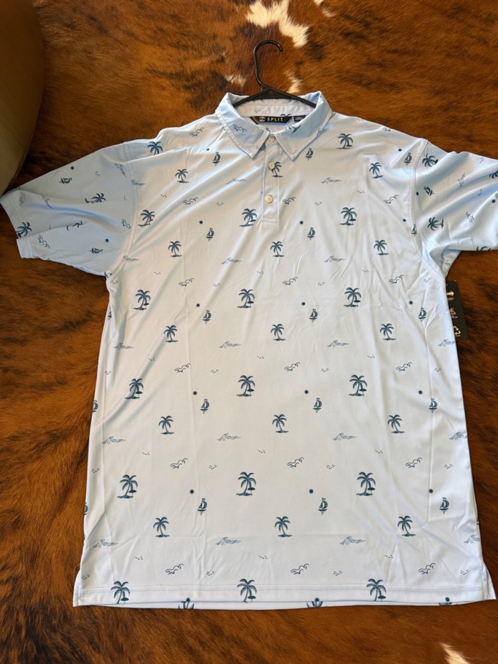 split Light Blue Polo with Navy Palm & Sailboat Motif